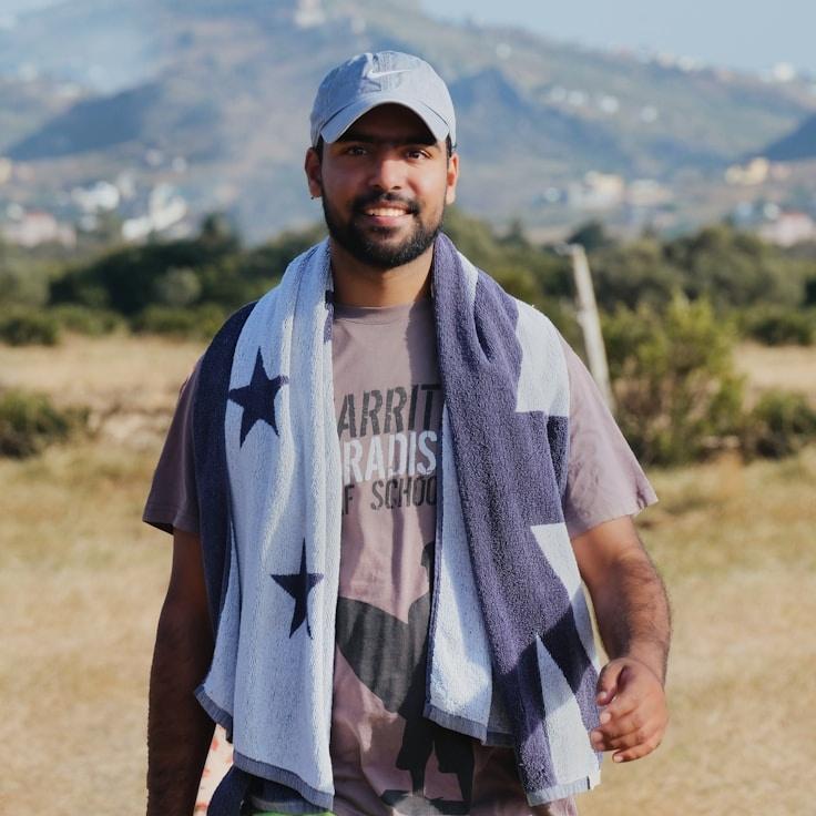 Avery Chen, Lead Design Curator at Success Mindset Plan, reviewing corporate floral arrangements